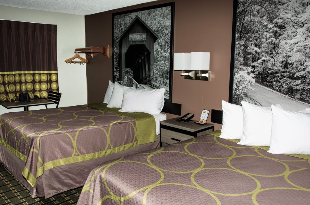 Two-queen guest room at the Michigan City hotel